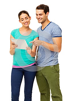 Happy Young Couple Using Tablet Computer