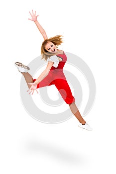 Happy young dancer jumping