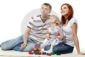 Happy young family with child.