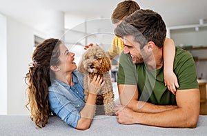 Happy young family having fun together at home. Happy childhood concept