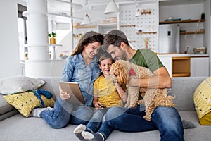 Happy young family having fun together at home. Happy childhood concept