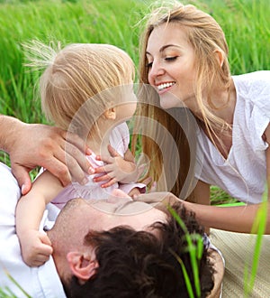 Happy young family outdoors