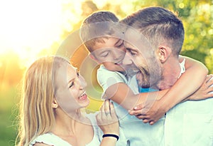 Happy young family outdoors