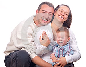 Happy young family posing