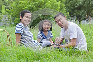 Happy young family spending time at outdoor on a day
