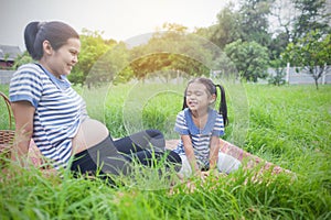 Happy young family spending time at outdoor on a day