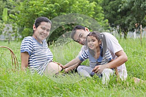 Happy young family spending time at outdoor on a day