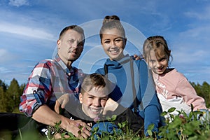 Happy young family spending time together, outdoors