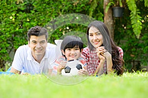 A happy young family spends time playing together