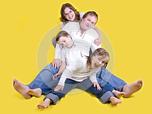 Happy young family - studio photo