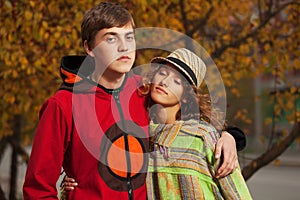 Happy young fashion hipster couple in love outdoor