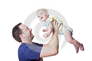Happy young father playing with little daughter