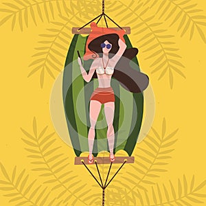 Happy young girl in a bathing suit bikini lying in a hammock by the sea and tropical plants. Top view concept with palm shadows.