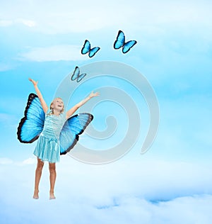 Happy Young Girl with Butterflies