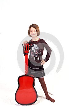 Happy Young Girl with Her Red Guitar