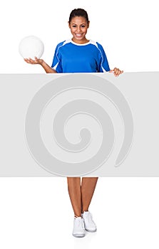 Happy Young Girl Holding Volleyball And Placard