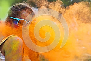 Happy young girl on holi color festival