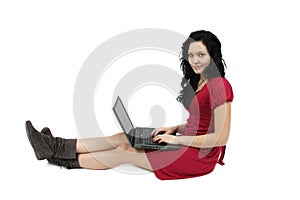 Happy young girl with laptop computer