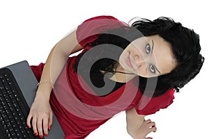 Happy young girl with laptop computer isolated