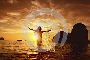 Happy girl run sunset sea beach