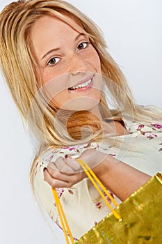 Happy young girl shopping