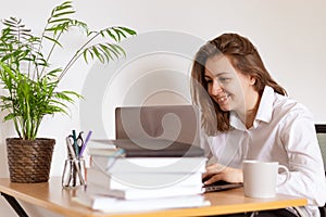 Happy young girl student watch webinar listen online course communicate by conference video call