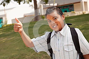 Happy Young Hispanic School Boy with Thumbs Up