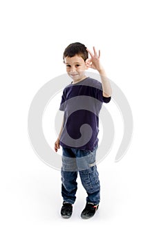 Happy young kid with okay sign gesture