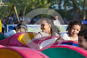 Happy Young Kids at Amusement Park