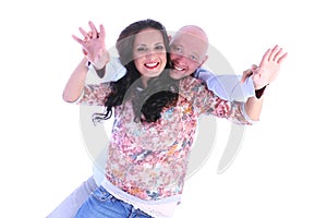 Happy young loving couple with arms open