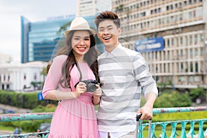 Happy Young Man And Beautiful Smiling Woman Traveling And Sightseeing City Attrcations. High Quality Image