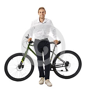 Happy young man with bicycle on background