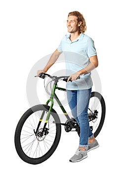 Happy young man with bicycle on background