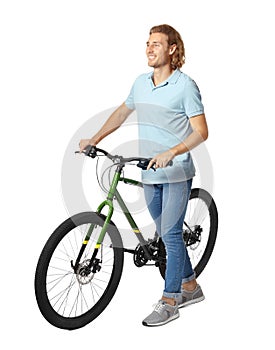 Happy young man with bicycle on white