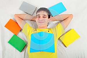 Happy Young Man with the Books