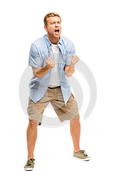 Happy young man celebrating success on white background