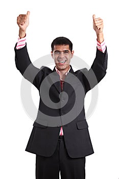 Happy young man showing thumbs up