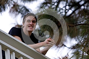 Happy young man smiling