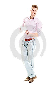 Happy young man with tablet computer - full body isolated