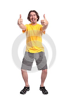 Happy young man with thumbs up