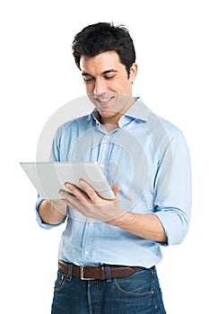 Happy Young Man Using Digital Tablet photo