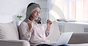 Happy young mixed race businesswoman holding online video call.