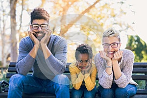 Happy young mixed race couple spending time with their daughter