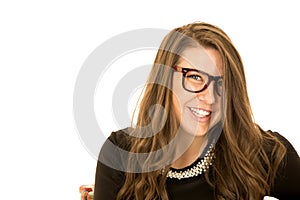 Happy young model wearing a black dress and fun glasses