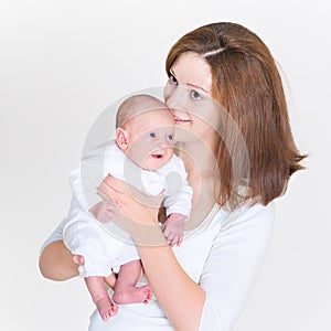 Happy young mother holding her newborn baby