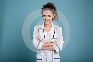 Happy young nurse with stethoscope