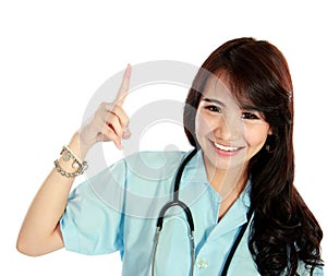 Happy young nurse with stethoscope and thinking