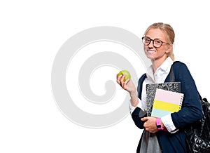 Happy young student girl holding books. Back to school