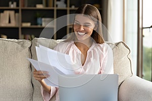 Happy young student girl receiving admission letter from business school