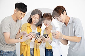 Young student people watching the smartphones photo